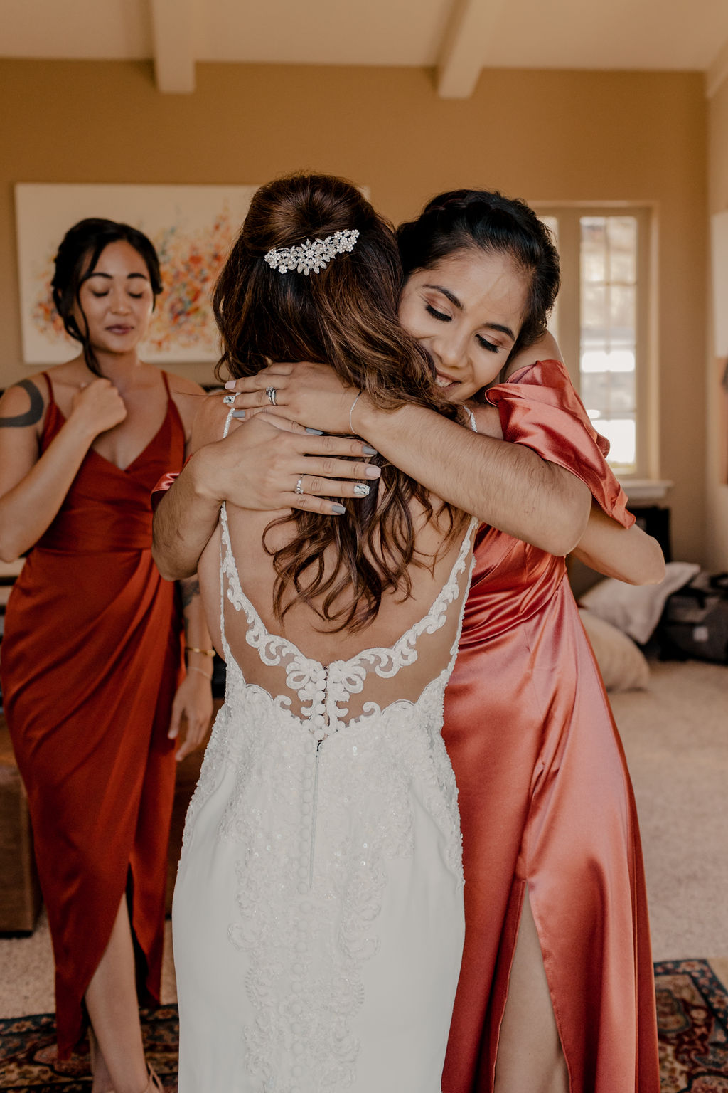 bridesmaids reaction to seeing bride in lace wedding dress