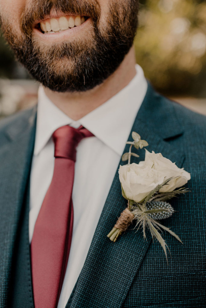groom suit and boutonniere 