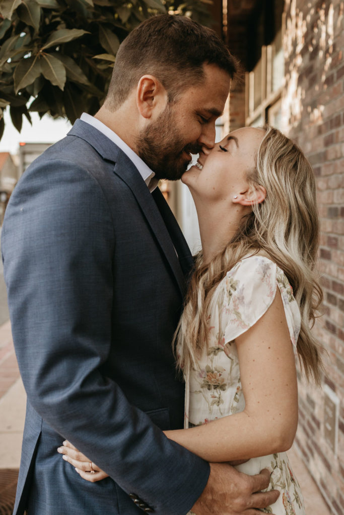 couple kissing at engagement session