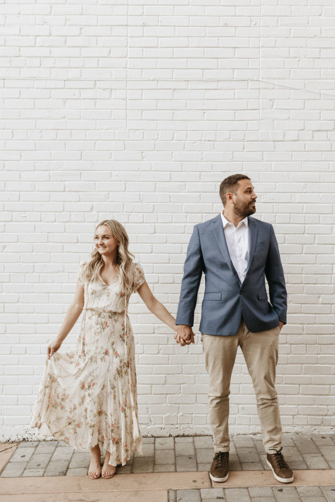 engagement photos of couple holding hands