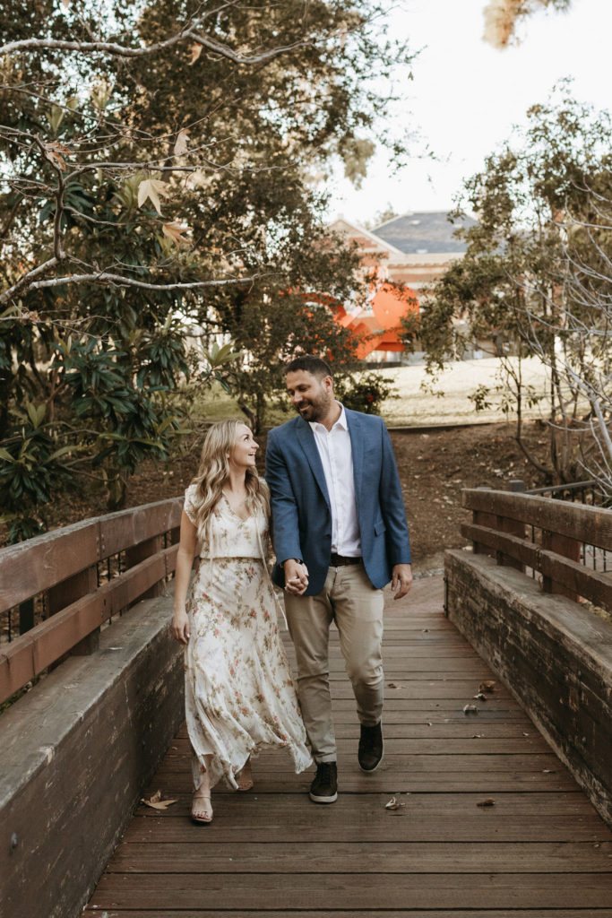 engagement photos in san luis obispo with couple holding hands