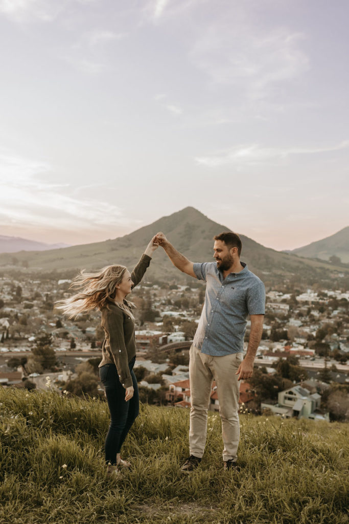 couple dancing on cliff in san luis obispo