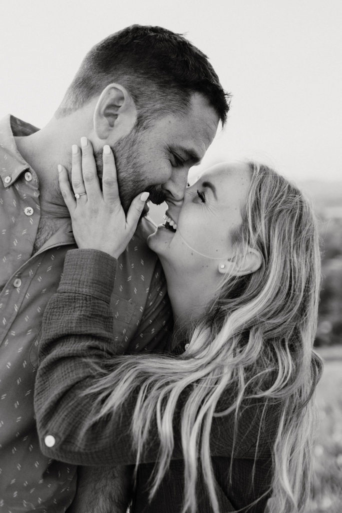 couple hugging during engagement photos