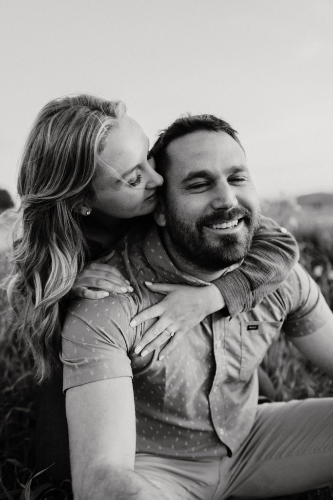 engagement pictures with couple hugging