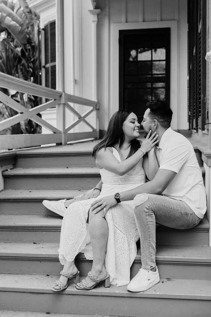 couple kissing on stairs