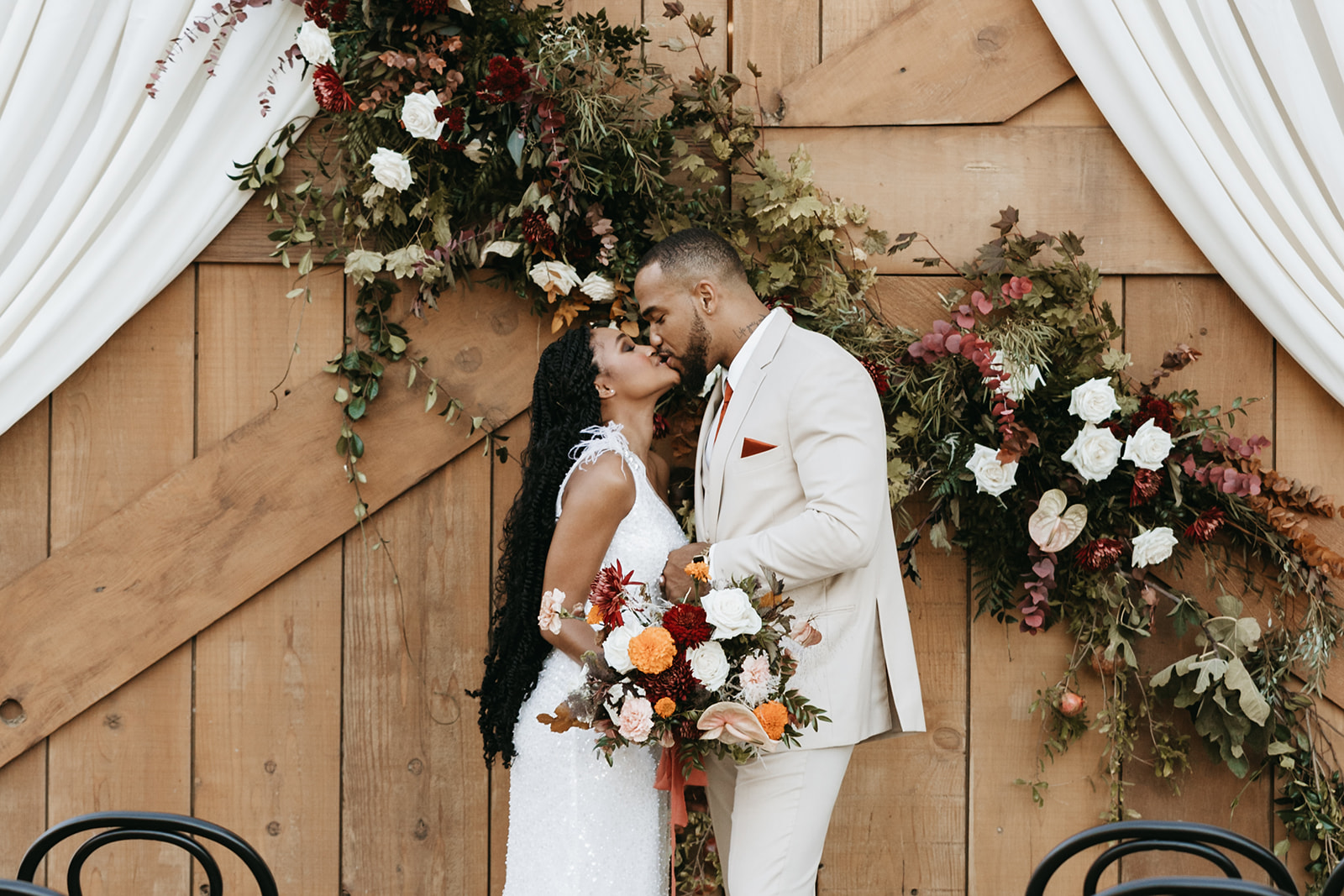couple kissing at wedding Tar Creek Ranch - A Rustic Wedding Venue in San Luis Obispo