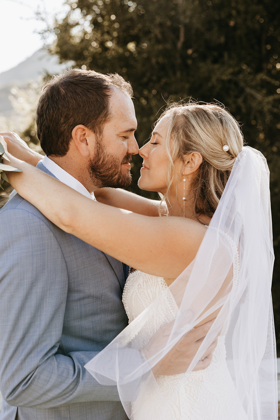 bride and groom kissing | The Penny: A Downtown Wedding Venue in San Luis Obispo