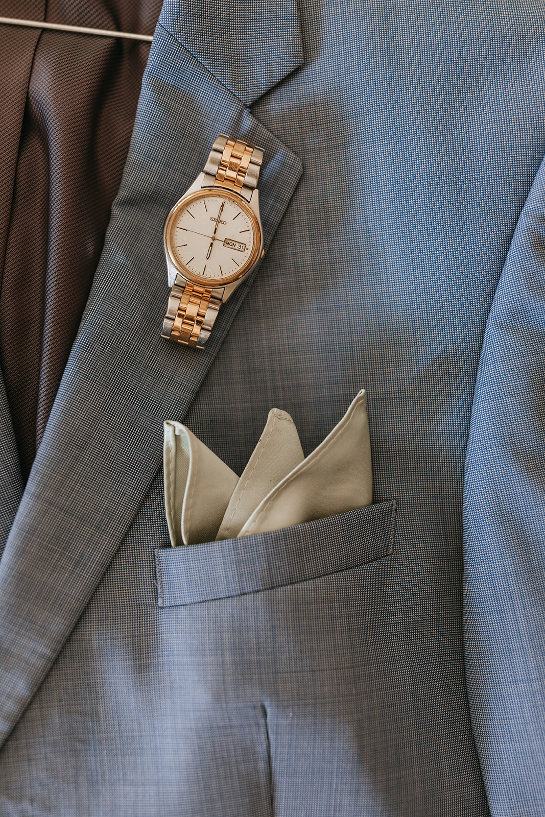 grooms suit with a watch | The Penny: A Downtown Wedding Venue in San Luis Obispo