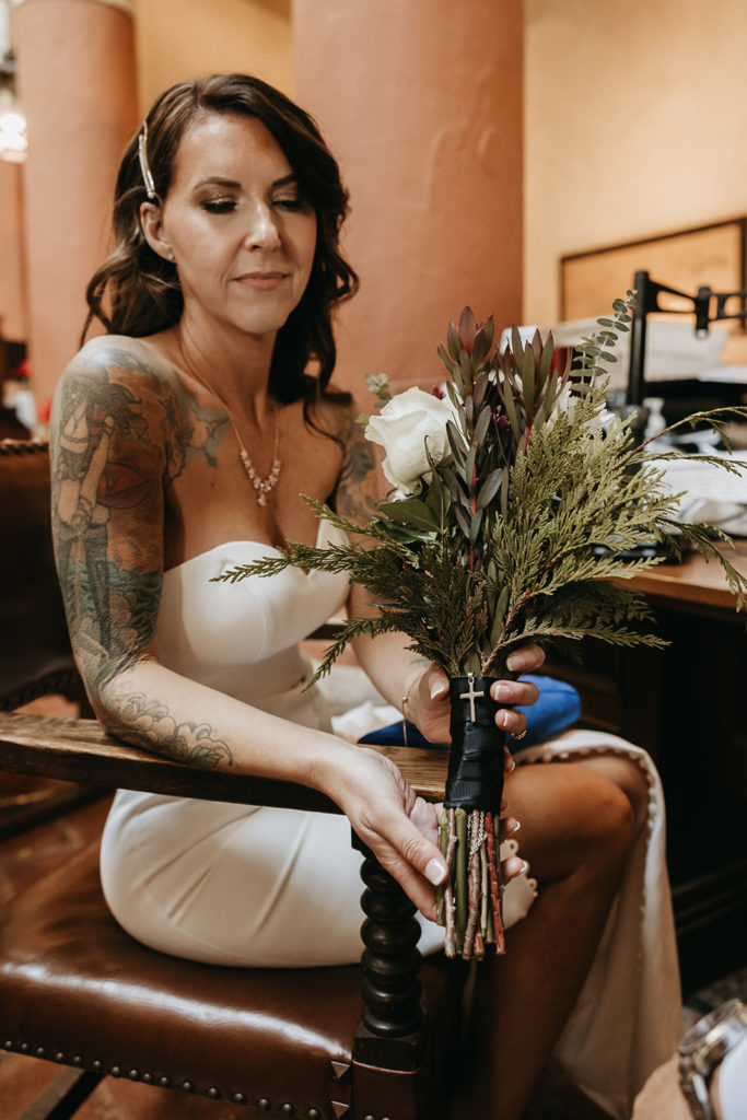 bride sitting during her courthouse elopement