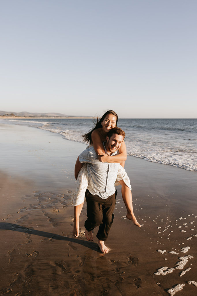 couple walking and posing on the beach after their engagement | A Surprise Beach Proposal in the Bay Area | Steven & Stephanie
