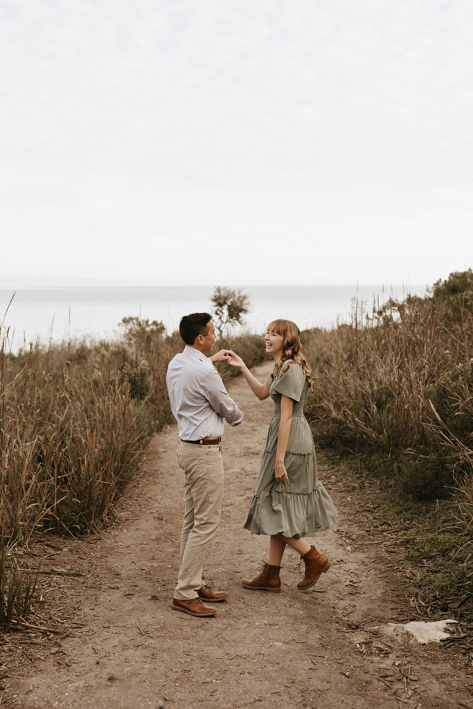 couple posing for their engagement photos | The Importance of Taking Engagement Pictures in Santa Barbara