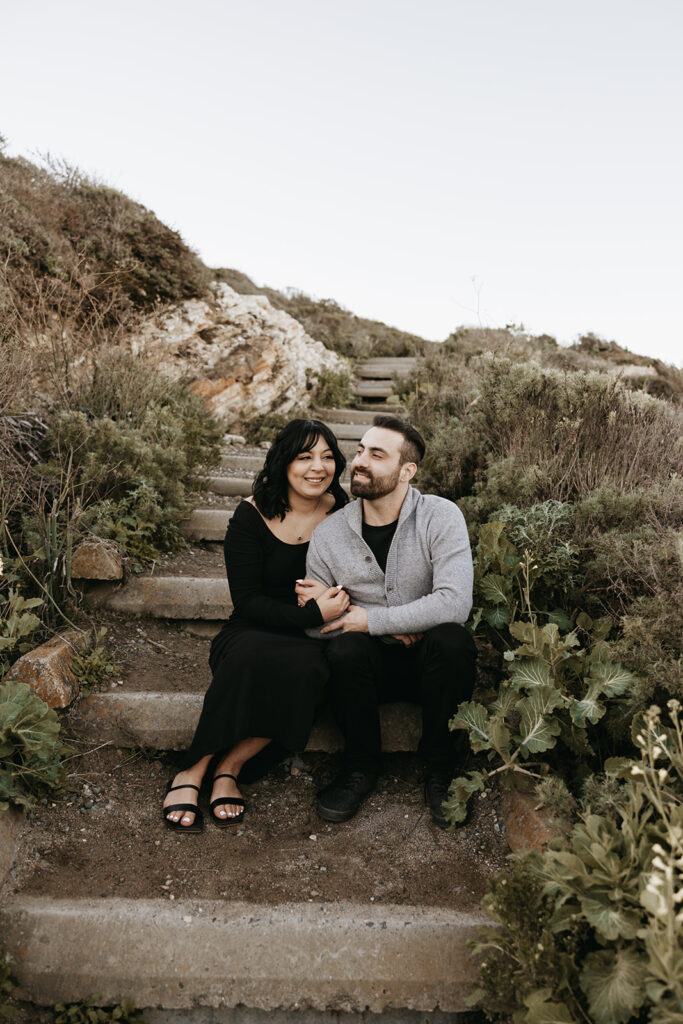 Couple posing for their engagement photos in santa barbara
