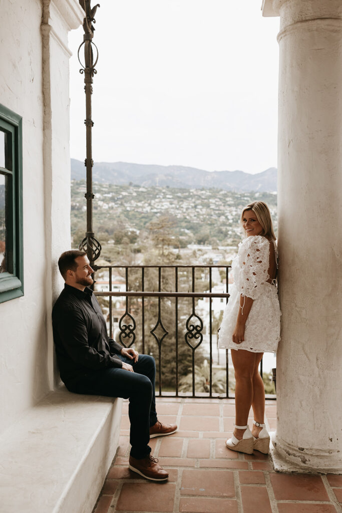 Couple posing for their engagement photos to prepare for their elopement in santa barbara
