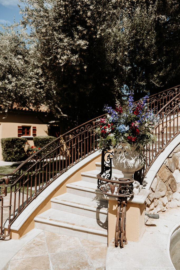 stairs and wedding flowers at calipaso winery and villa