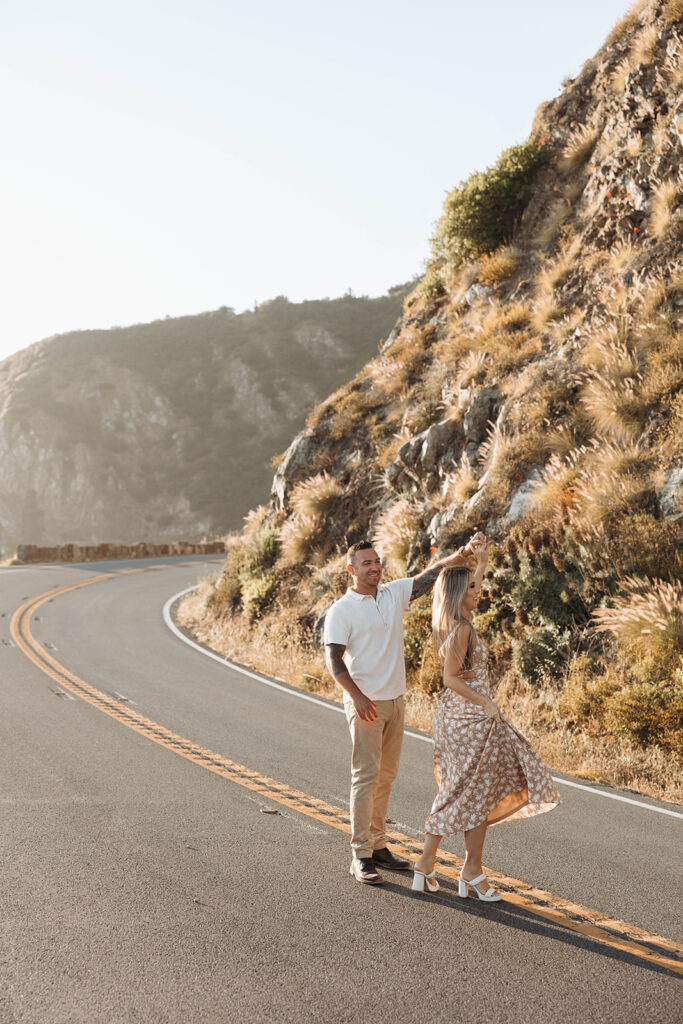 couple posing on cliffs for their engagement photos
