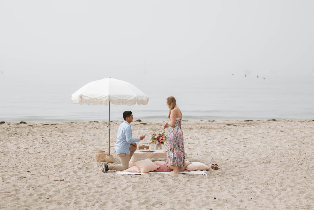 couple posing in santa barbara for their engagement photoshoot - unique proposal
