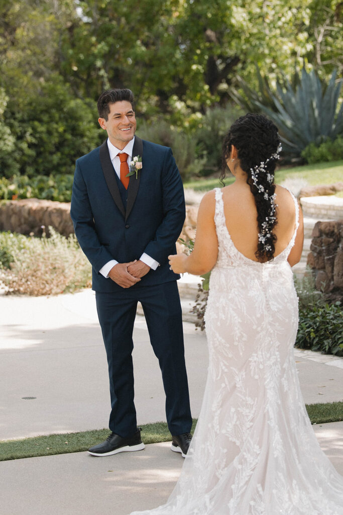 bride and groom posing for their wedding portraits | elegant garden wedding at Quail Ranch in Simi Valley