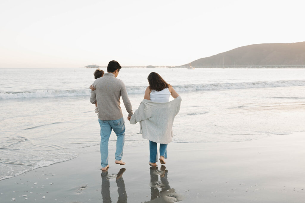 a family photoshoot on the beach in california
