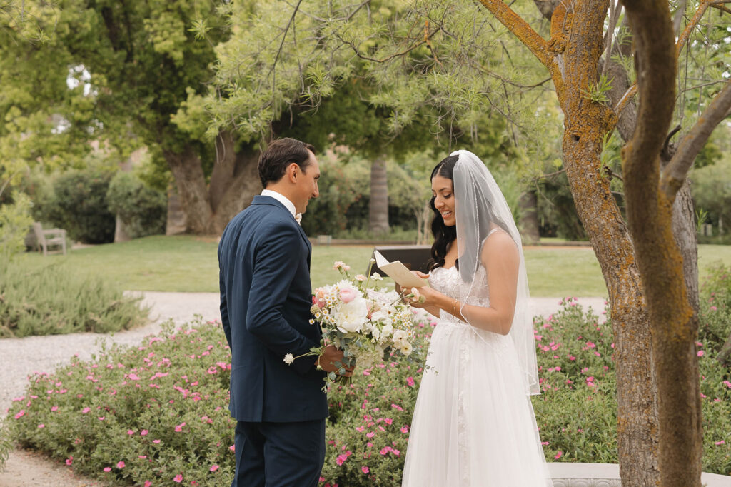 couple posing for  a first look
