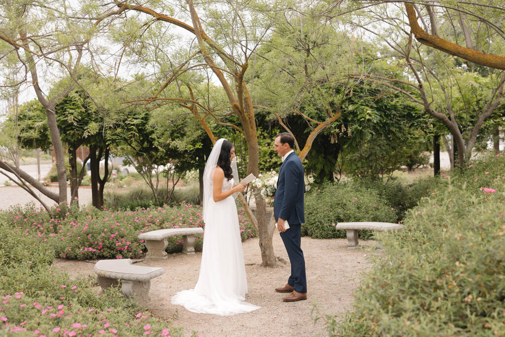  bride and groom having a first look photoshoot
