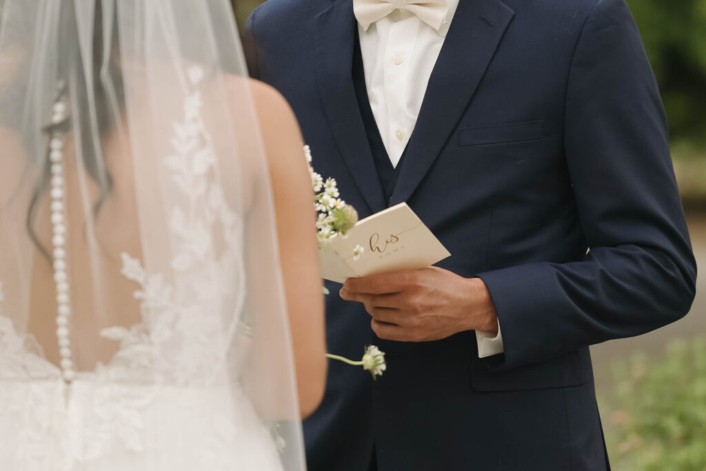  bride and groom having a first look photoshoot
