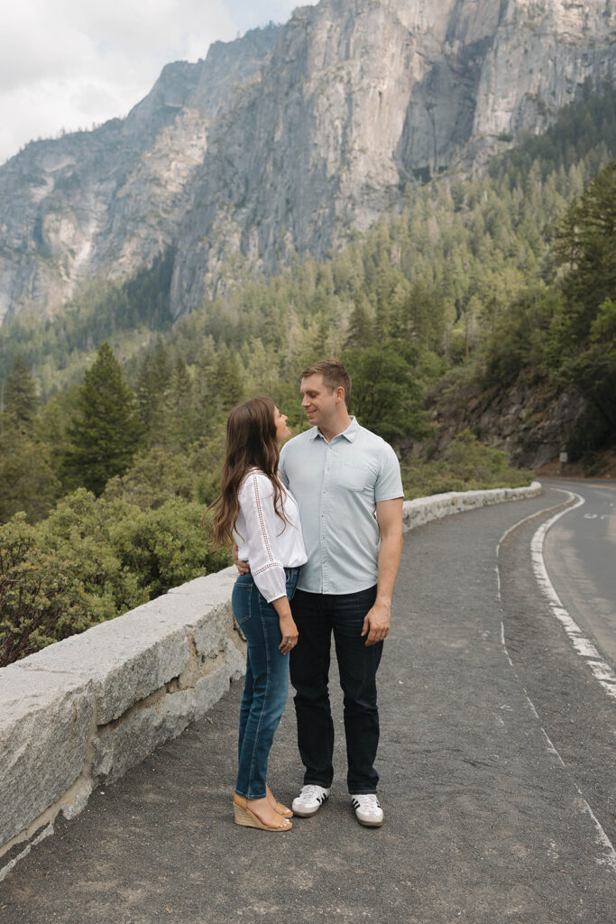 a couple having their engagement photos at yosemite natural park
