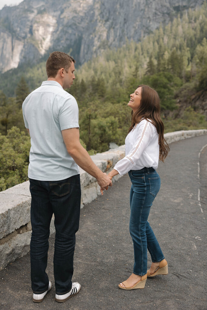 a couple having their engagement photos at yosemite natural park
