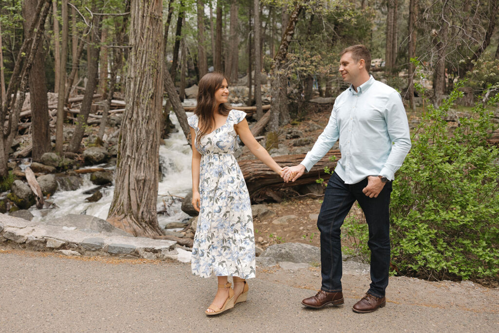 a couple having their engagement photos at yosemite natural park
