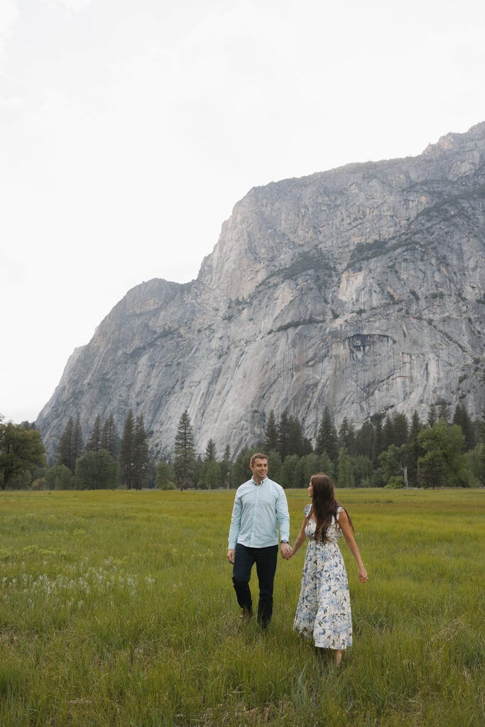 a couple having their engagement photos at yosemite natural park
