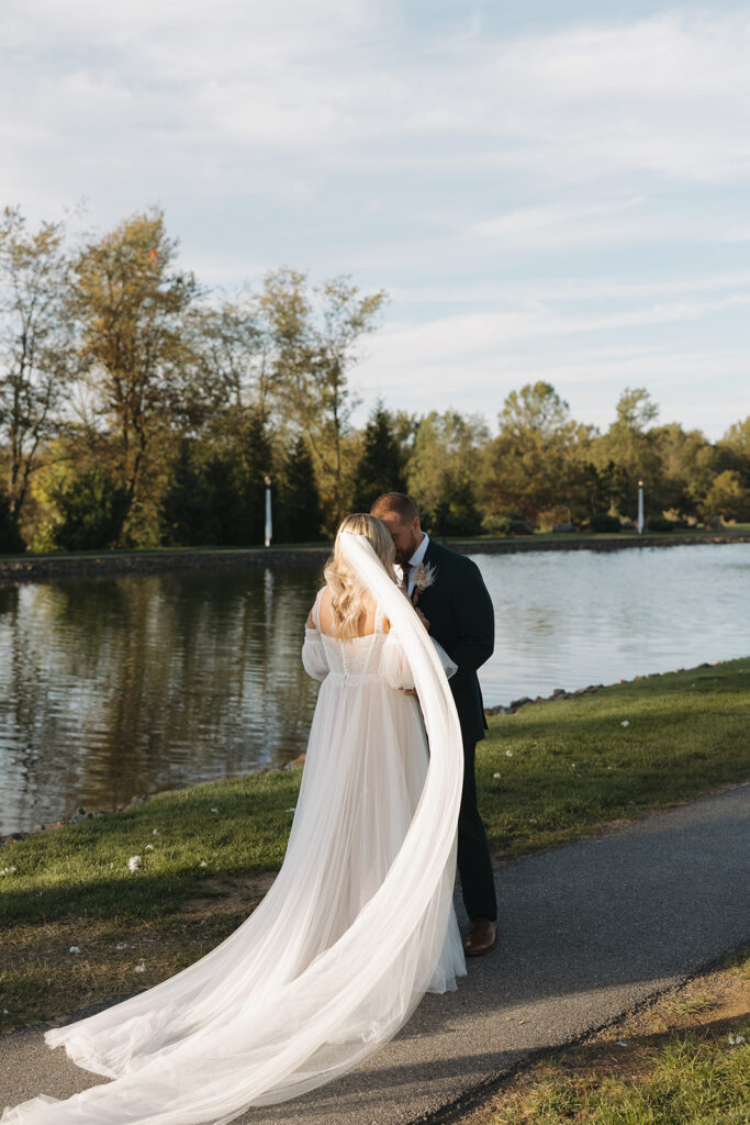 bride and groom posing for wedding photos
