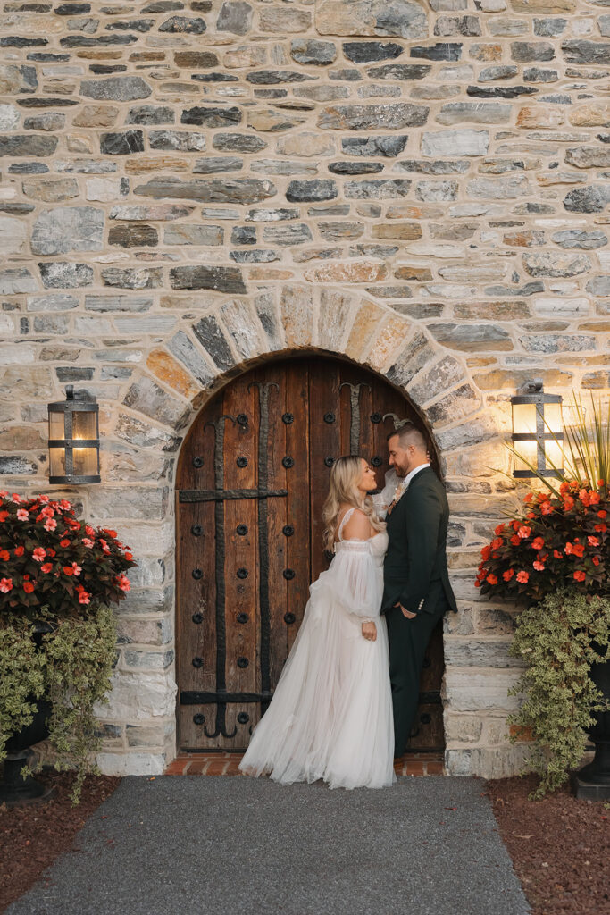 bride and groom posing for wedding photos
