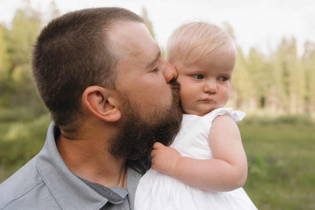 a family photo session in a field
