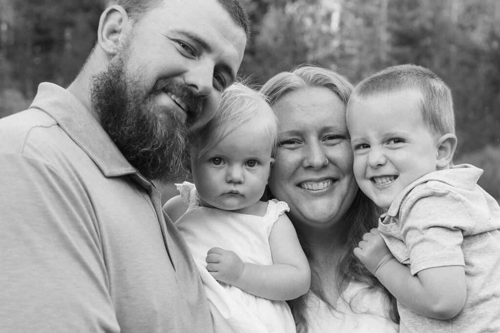 a family photo session in a field
