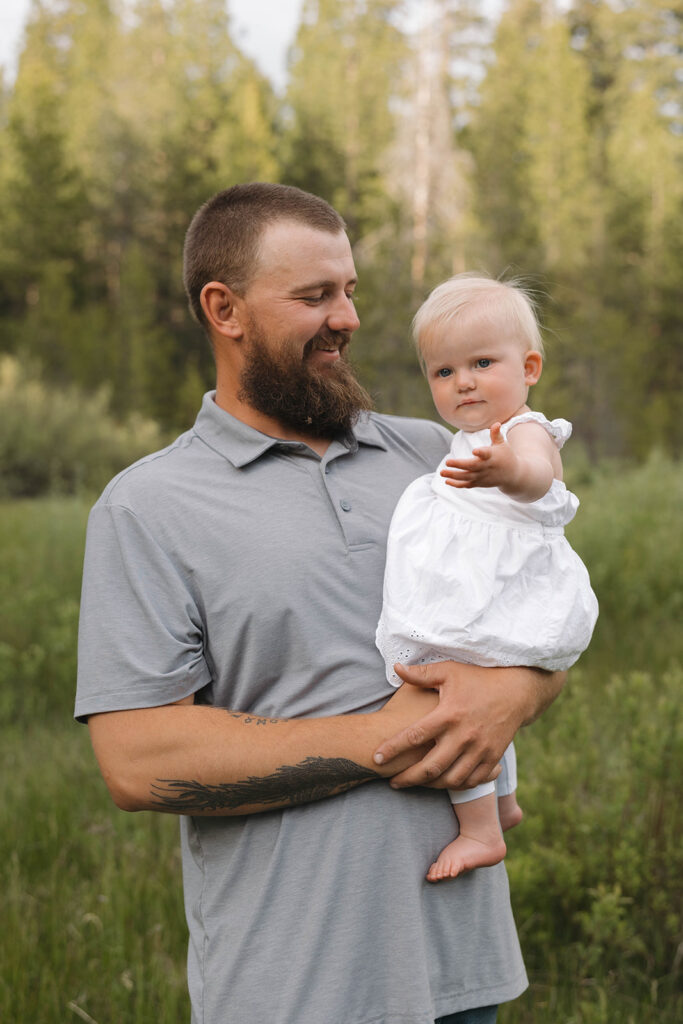 a family photo session in a field
