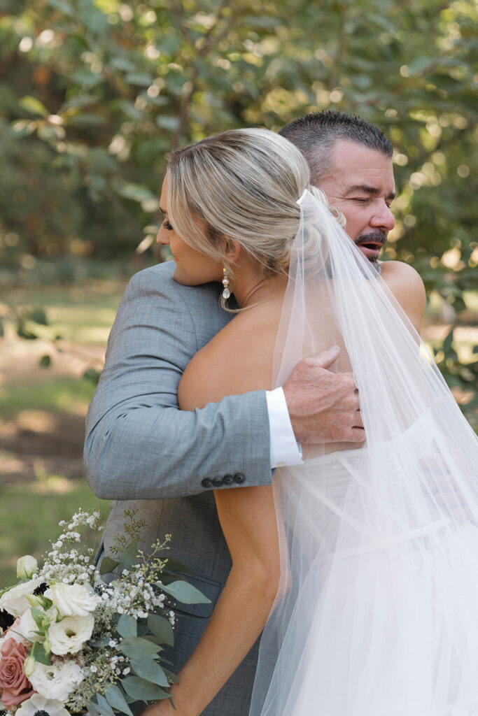 Emotional orchard wedding family photos in Sacramento California