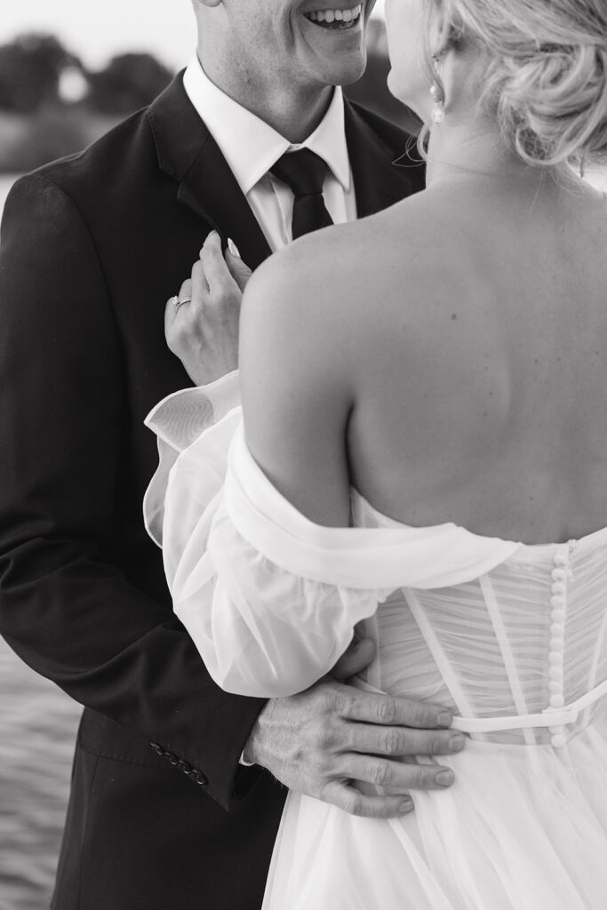 Romantic Sacramento orchard wedding portraits by the river at golden hour