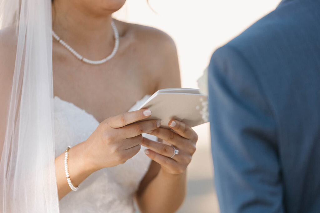Bride and groom sharing a candid moment on their wedding day